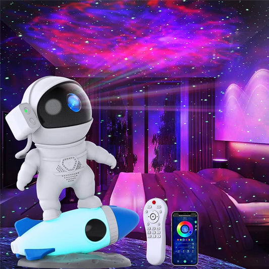 Proyector Cohete Astronauta con 12 Discos de Cielo Estrellado – Lámpara Nocturna Planetario